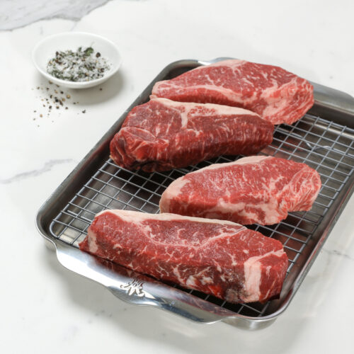 Mismatched New York Strip Steaks