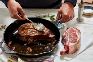 cooking steak on cast iron